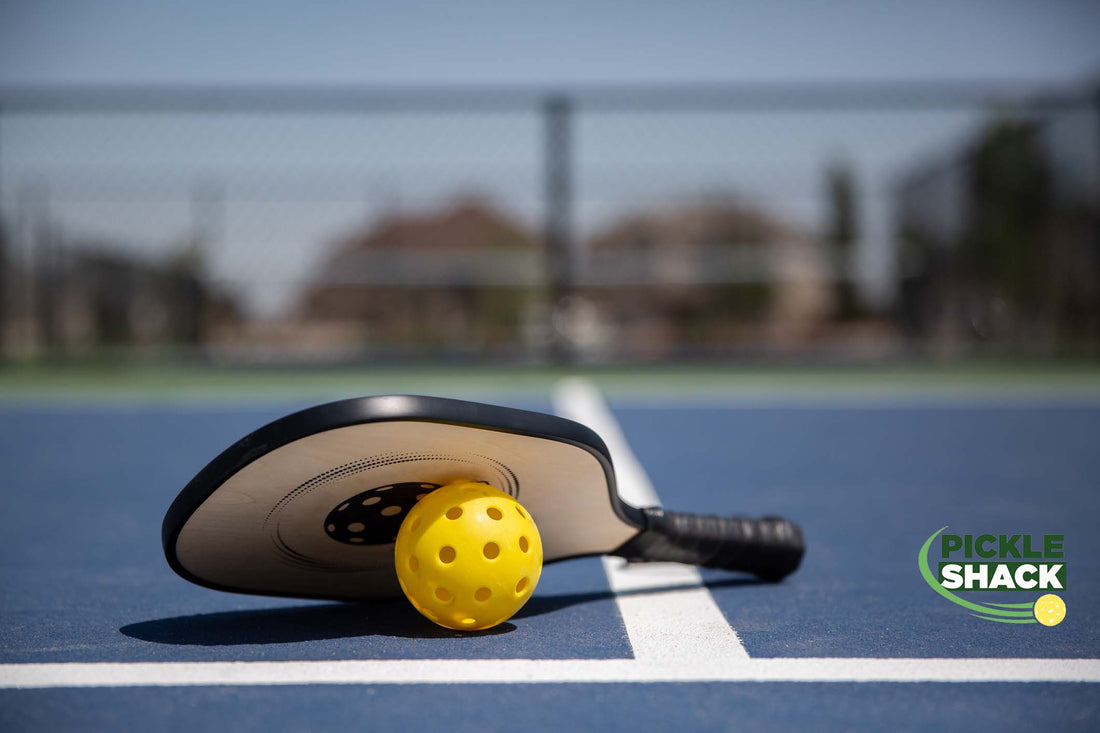 pickleball paddles on court