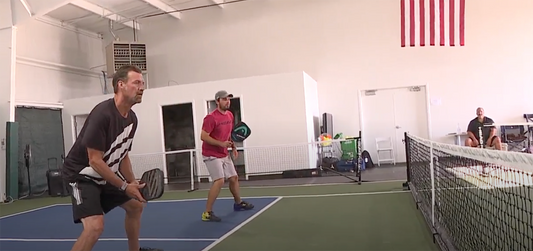 newscaster playing pickleball at Pickle Shack
