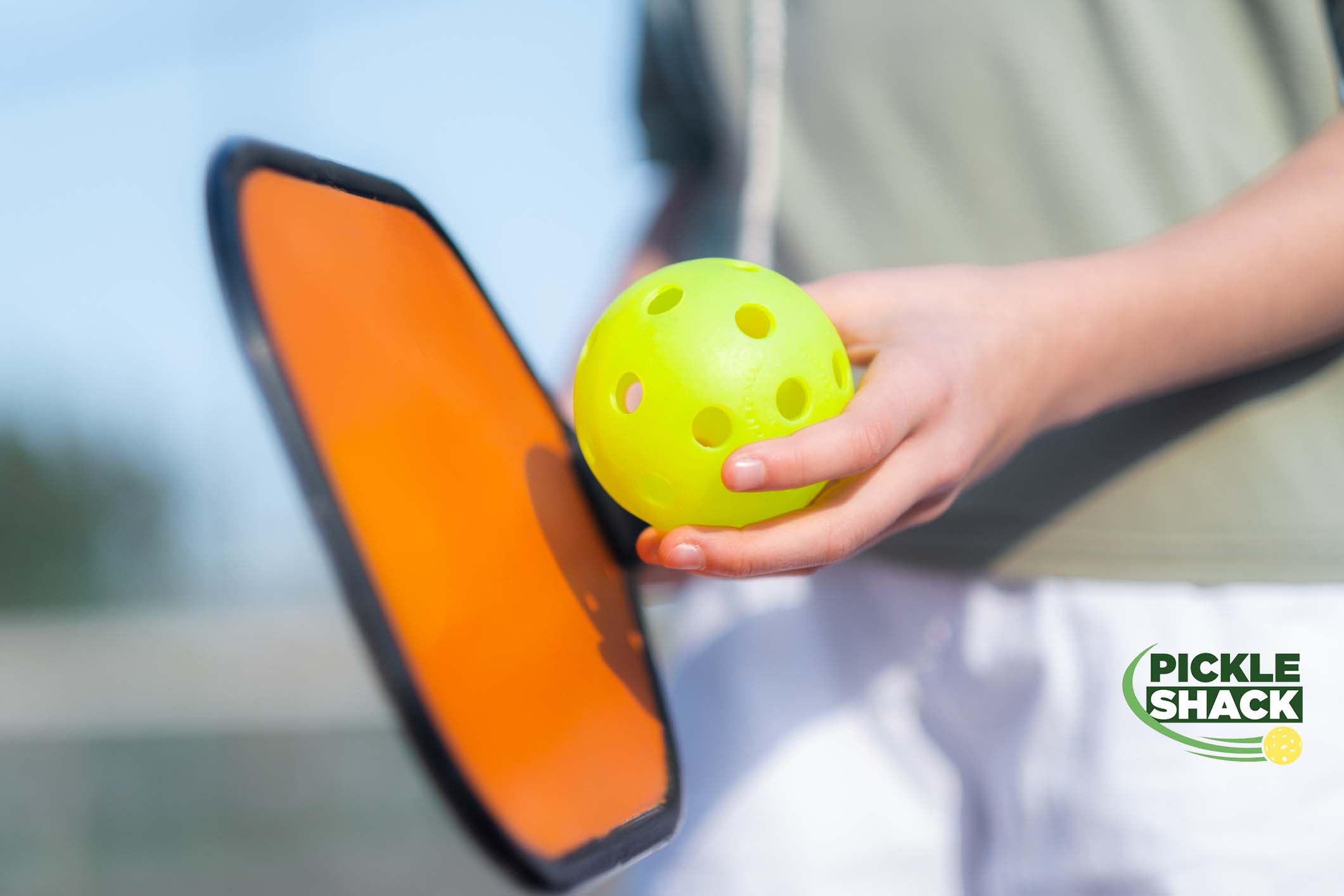 pickleball paddle and ball